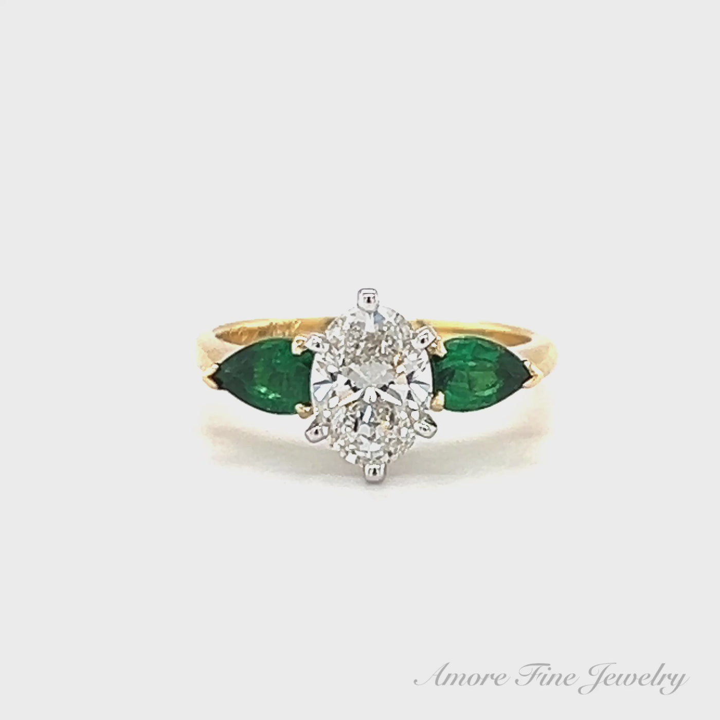 Oval Lab Grown Diamond and Emerald Engagement Ring