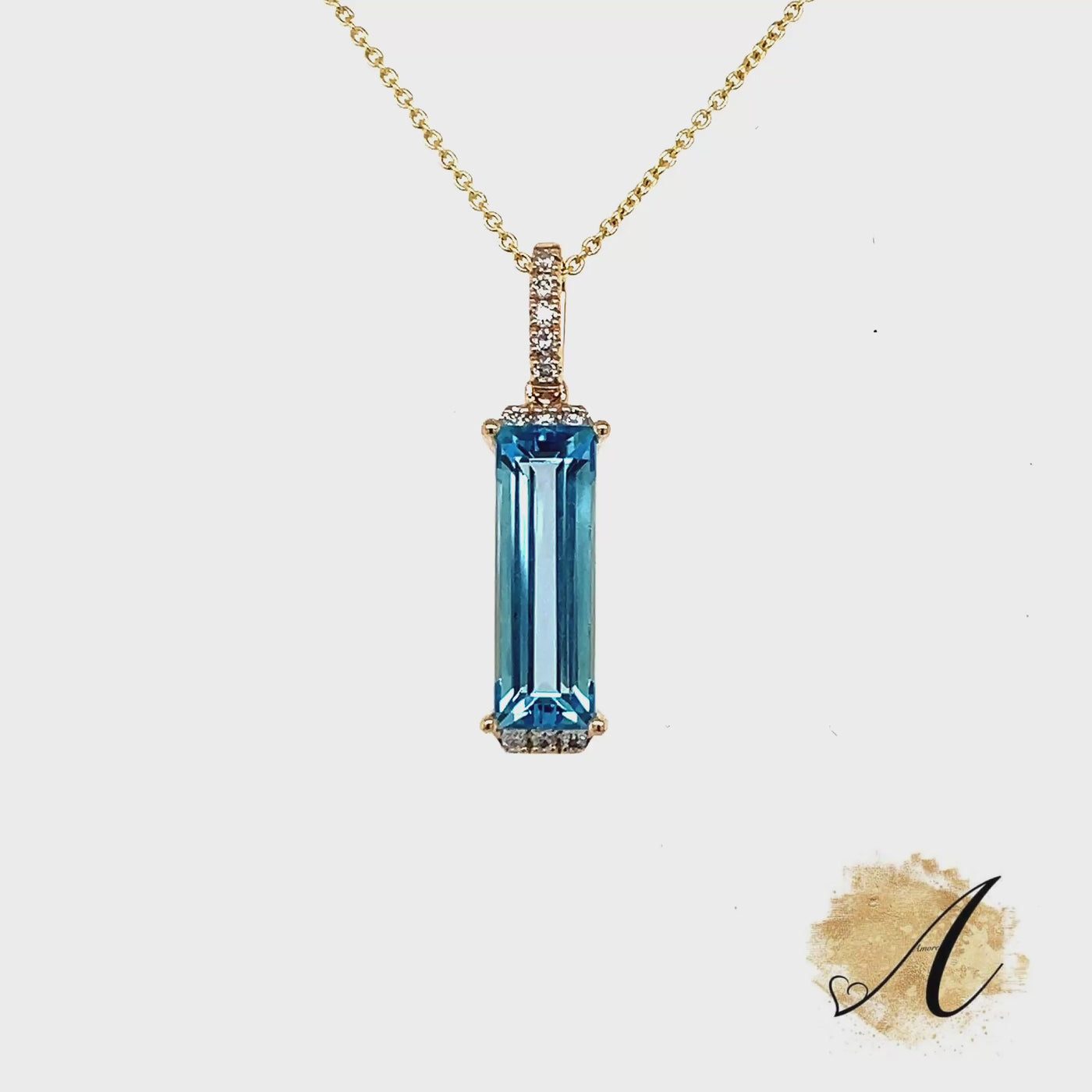 Elongated Blue Topaz Pendant